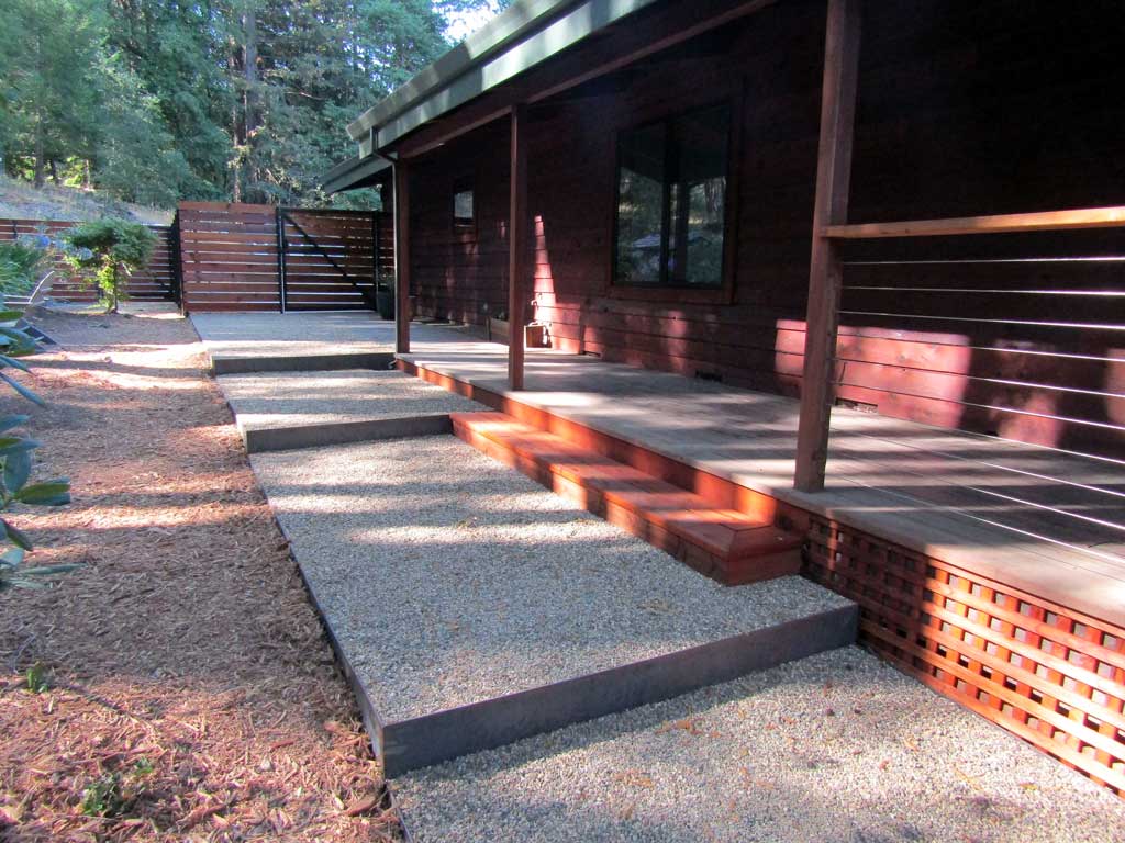 Stone paving and steps integrated with the garden